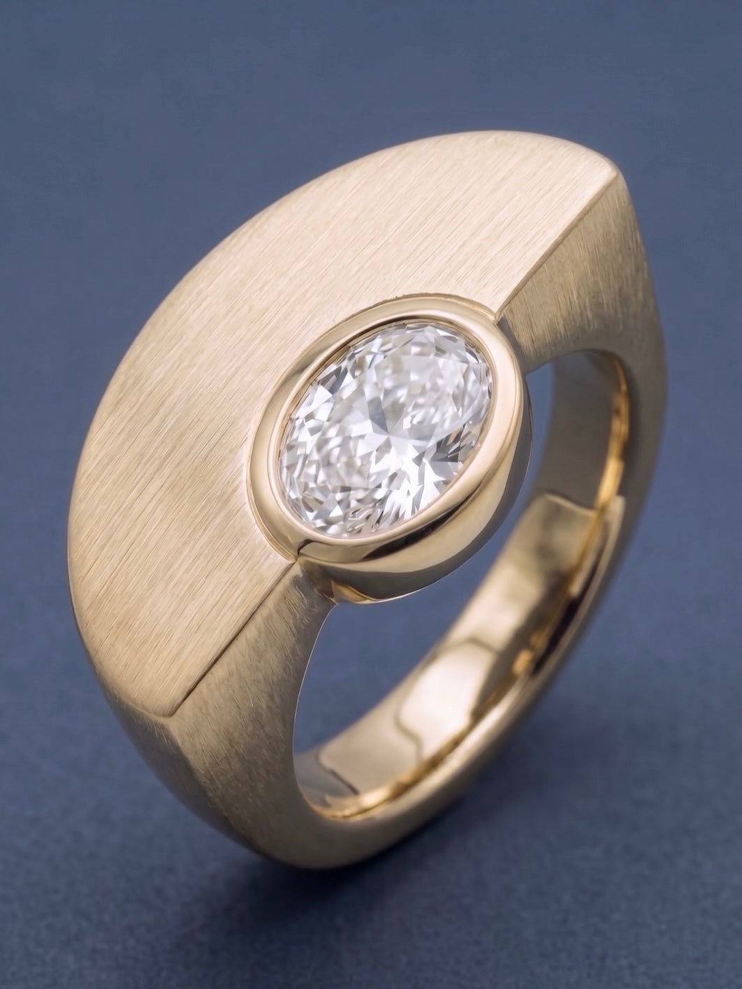 corner ring bezel — bezel detail, oval diamond in brushed 18k gold