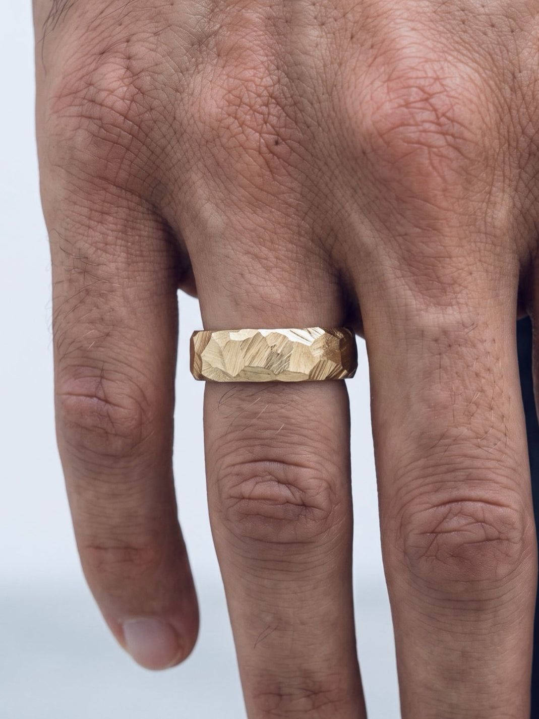 material ring IIII, irregular hand-carved planes in solid 18ct gold