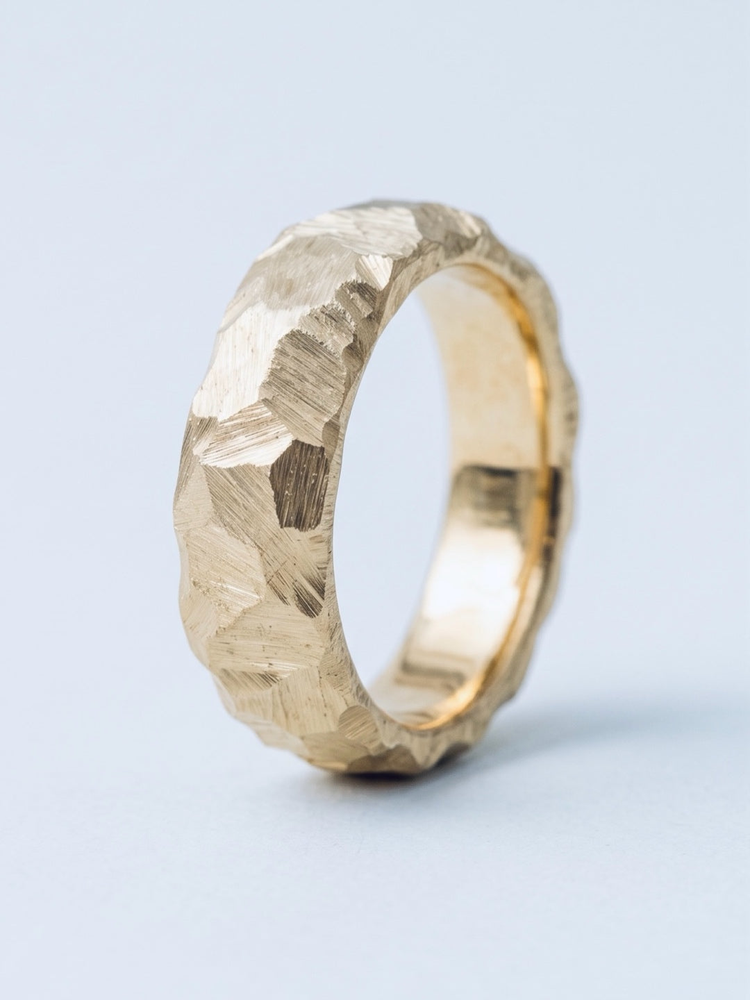 material ring IIII, carved gold surface without stones