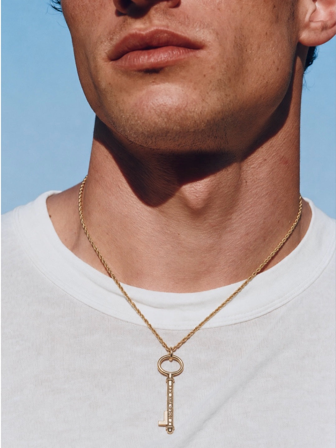 i hold the key pendant — engraving detail